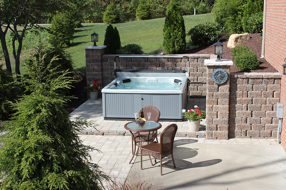 Country Manor hot tub with landscaping image