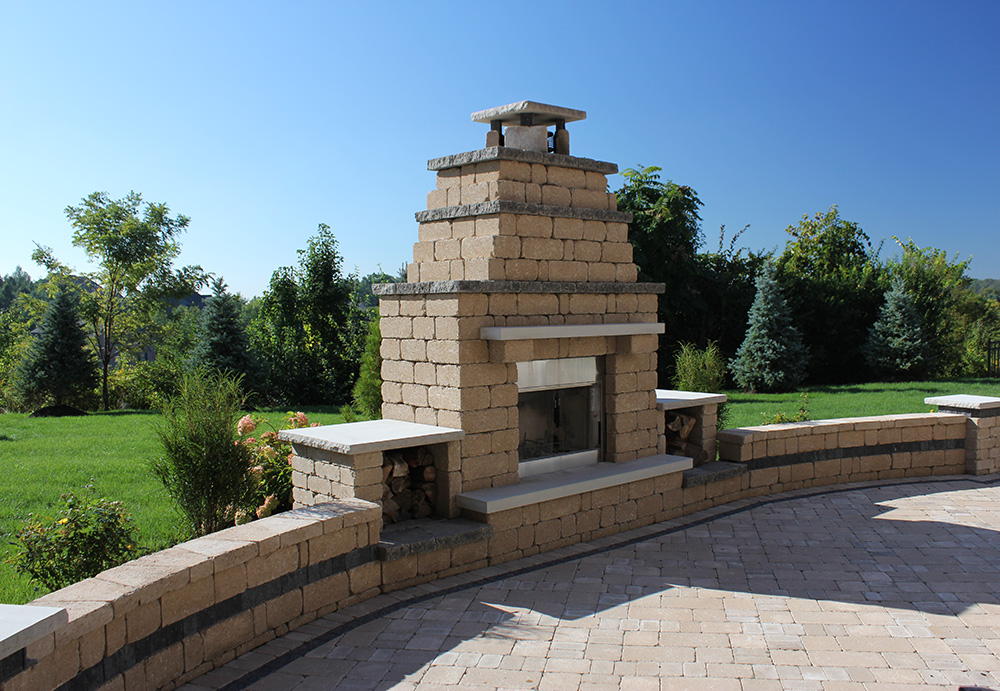 Dealer image of stone fireplace and patio