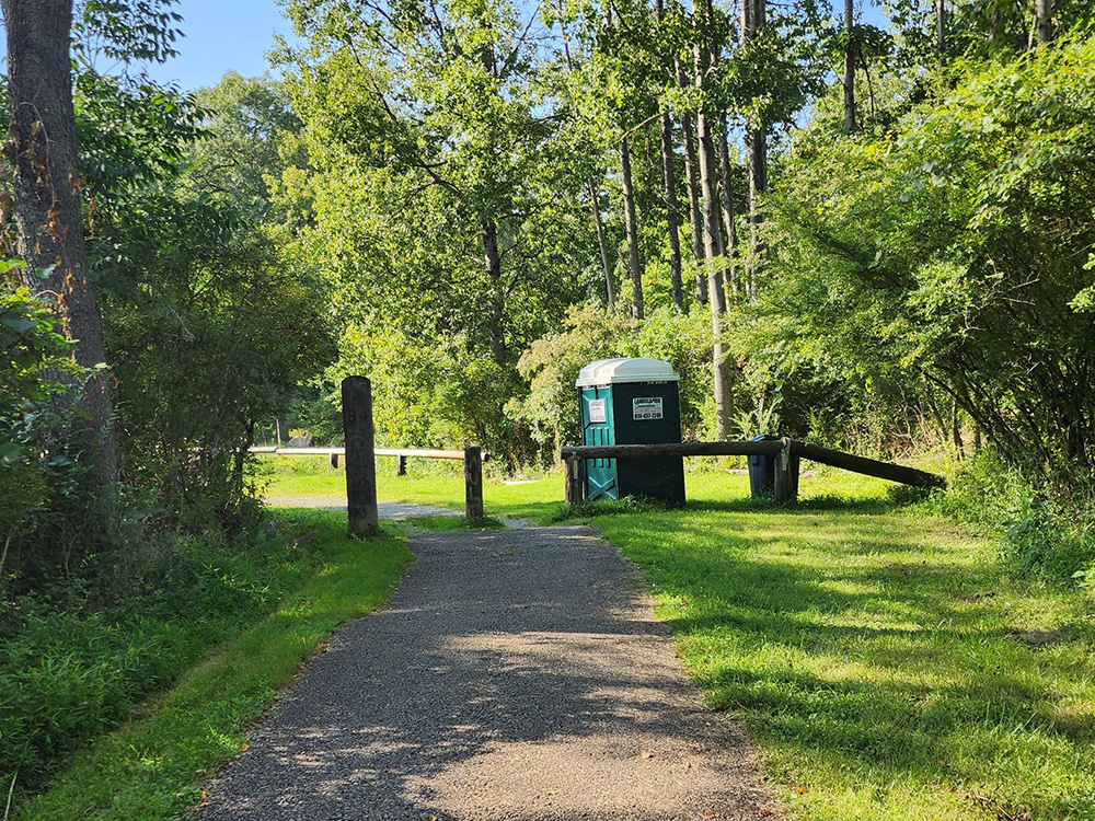 Portable ADA toilet in a trail